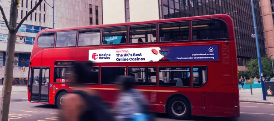 Double-decker bus in Birmingham featuring Casino Hawks advertisement