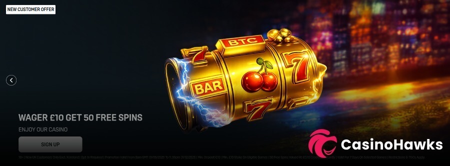 DAZN Bet Casino promotional hero banner against a dark background with blurred city lights at night. A top-left badge reads "NEW CUSTOMER OFFER" above bold headline text "WAGER £10 GET 50 FREE SPINS" and subtext "ENJOY OUR CASINO" next to a grey "SIGN UP" button. The center features a glowing golden 3D slot machine reel showing traditional lucky 7s, BAR, cherries, and a BTC symbol with blue lightning effects. Includes a CasinoHawks watermark and bottom UKGC compliance fine print (18+, New UK Customers Only, Min Deposit £10, Min £10 Stake on Eligible Games, 50 Free Spins Validated at £0.10, Valid for 7 Days).