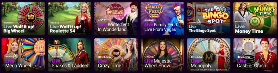 An online casino live game show lobby grid featuring twelve game tiles with live hosts and prize wheels. Top row includes Inspired Gaming's Live Wolf It Up! Big Wheel and Live Wolf It Up! Roulette 54, Playtech's Live Winterfest In Wonderland and Live Family Feud Live From Vegas, and Pragmatic Play's Live The Bingo Spot and Live Money Time. Bottom row features Pragmatic Play's Live Mega Wheel and Live Snakes & Ladders, Evolution Gaming's flagship Live Crazy Time, OnAir Entertainment's Live Majestic Wheel Show, Evolution's Live Monopoly, and Evolution's Live Cash or Crash.