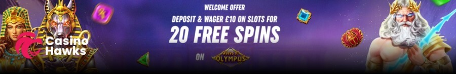 A vibrant purple promotional casino welcome offer banner featuring prominent white typography reading "WELCOME OFFER DEPOSIT & WAGER £10 ON SLOTS FOR 20 FREE SPINS ON GATES OF OLYMPUS". On the left, an Egyptian queen and golden Anubis character stand behind floating gem icons alongside the Casino Hawks pink lion logo. On the right, Pragmatic Play's Zeus character holds a glowing blue lightning bolt beneath a floating green jewel and red scarab.