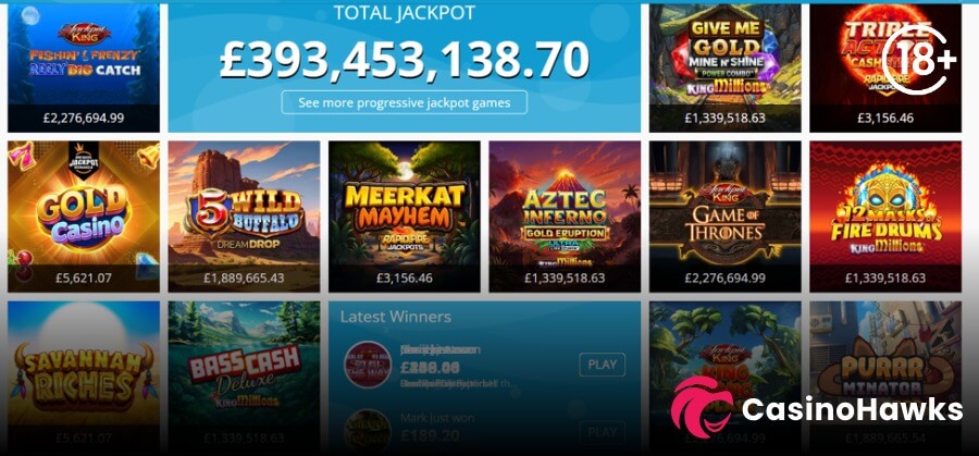 A progressive jackpot slot lobby layout displaying a prominent top banner with white text reading "TOTAL JACKPOT £393,453,138.70" above a "See more progressive jackpot games" button. Featured slot tiles include Fishin' Frenzy Reel' Em In Reely Big Catch Jackpot King (£2,276,694.99), Give Me Gold Mine N' Shine King Millions (£1,339,518.63), 5 Wild Buffalo Dream Drop (£1,889,665.43), Game of Thrones Jackpot King (£2,276,694.99), and 12 Masks of Fire Drums King Millions (£1,339,518.63). A "Latest Winners" live feed card sits in the bottom row. An 18+ age verification badge rests in the top right corner, and the Casino Hawks pink lion logo sits in the bottom right corner.
