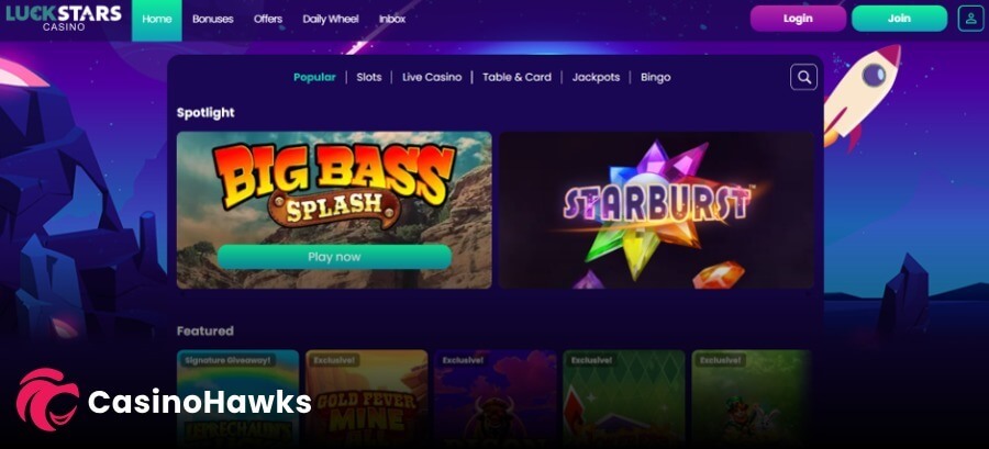 LuckStars Casino platform desktop landing page interface showcasing a dark blue space and rocket ship thematic background theme. The top header includes the "LuckStars Casino" brand logo alongside menu headers for Home, Bonuses, Offers, Daily Wheel, and Inbox, ending with purple "Login" and teal "Join" call-to-action buttons. The central "Spotlight" menu features two large game banners: Pragmatic Play's Big Bass Splash with a teal "Play now" button, and NetEnt's Starburst slot. A pink and white "CasinoHawks" affiliate watermark sits in the bottom left foreground corner.