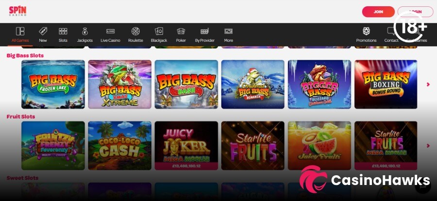 A clean desktop interface screenshot of the Spin Casino games lobby. The dark top navigation navigation bar features white icons for All Games, New, Slots, Jackpots, Live Casino, Roulette, Blackjack, Poker, and By Provider, alongside pink JOIN and LOGIN buttons and an 18+ badge in the top right. The main section displays a row of Big Bass Slots including Big Bass Frozen Lake, Big Bass Xmas Xtreme, Big Bass Christmas Bash, Christmas Big Bass Bonanza, Bigger Bass Blizzard, and Big Bass Boxing Bonus Round. Below is a Fruit Slots category row displaying Frenzy Fevorrenzy, Coco-Loco Cash, Juicy Joker Mega Moolah, Starlite Fruits, Juicy Fruits, and Starlite Fruits Mega Moolah, with the Casino Hawks pink lion co-branding logo in the bottom right corner.
