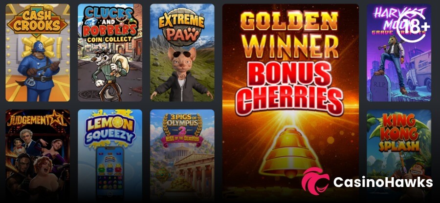 A dark online casino lobby grid showcasing slot game tiles. A large central tile highlights Inspired Gaming's Golden Winner Bonus Cherries featuring a glowing golden bell. Surrounding square tiles include Cash Crooks, Clucks and Robbers Coin Collect, Extreme Paw, Harvest Moon Grave Diggers, Judgemental, Lemon Squeezy, 3 Pigs of Olympus 2 Rise of the Demigods, and King Kong Splash. An 18+ age verification badge appears in the top right corner, and the Casino Hawks pink lion co-branding logo sits in the bottom right corner.