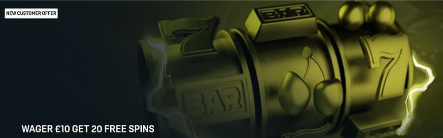 UK online casino promotion banner advertising a "Wager £10 Get 20 Free Spins" incentive for new players. The image showcases a sleek, golden mechanical slot machine in mid-spin, highlighting symbols like cherries and BAR icons. The design uses a premium black and gold color palette with electric blue and yellow lightning effects to signify a big win potential.