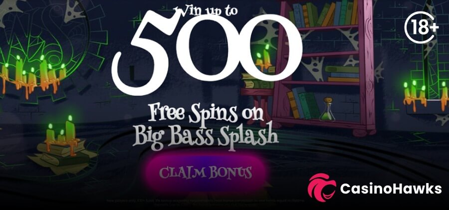 A dark magic-themed promotional casino banner featuring prominent white text reading "Win up to 500 Free Spins on Big Bass Splash" above a glowing purple "CLAIM BONUS" button. Set against a wizard's study with green candles, books, cobblestone walls, and cobwebs. An 18+ age restriction badge sits in the top right corner, fine print T&Cs sit at the bottom, and the Casino Hawks pink lion co-branding logo rests in the bottom right corner.